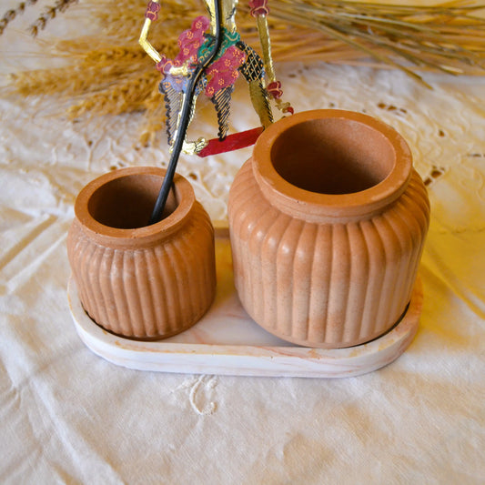 Image de Flora — Pot décoratif en jesmonite terracotta | Le sens des choses – boutique artisanale éthique de bougies parfumées et savons naturels fabriqués en France